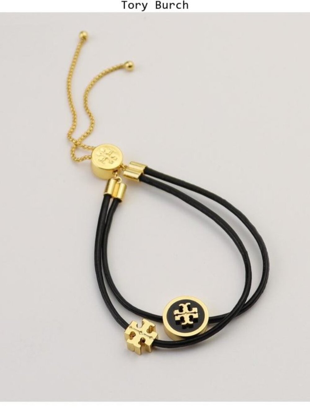 Tory Burch Black and Gold Logo Slider Bracelet